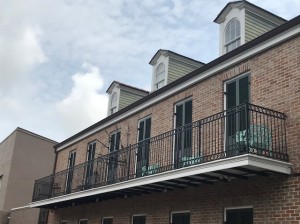 A balcony in the French Quarter that was replaced by Mayer Building Company in New Orleans, LA
