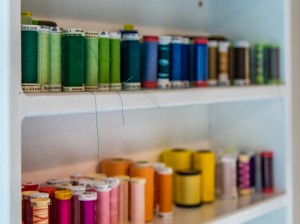 Threads on a shelf at The Suzanne Perron Studio after renovation job done by Mayer Building Company in New Orleans, LA
