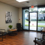 Upgraded reception and lobby area for an office building designed by Mayer Building Company in New Orleans, LA